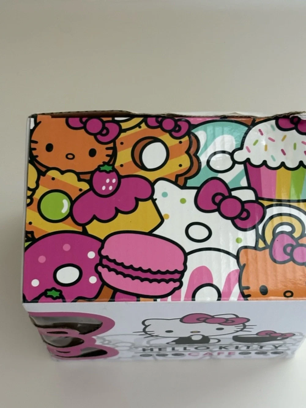 NIB Hello Kitty Cafe White Mug Pink Handle Gray Graphics Logo Box Artwork 12 oz